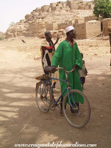 Kori-Maounde resident with his bicycle