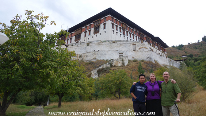 Sonam, Steph, and Craig beneath the Paro Rinpung Dzong