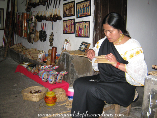 Woman makes a rondador, anda Maachi instrument workshop in Peguche
