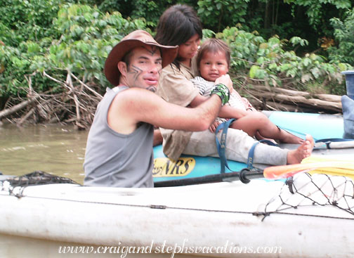 Felipe plays with a Huaorani baby