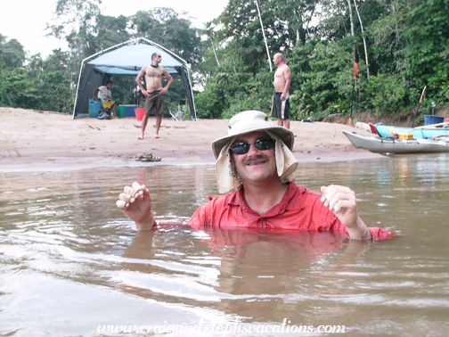 Craig cools down in the Shiripuno River