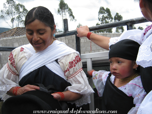 Following the Inti Raymi dancers in a pick-up truck
