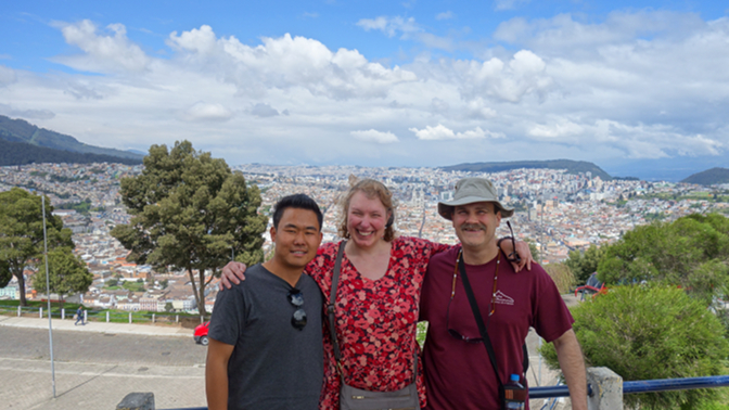 Sonam, Steph, and Craig look out over the city from El Panecillo
