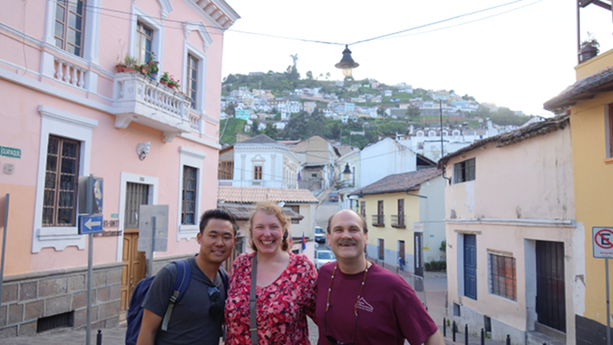 Sonam, Steph, and Craig in La Ronda with the Virgin of Quito in the background