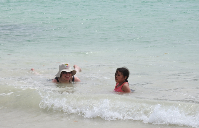 Achi Mama and Sisa playing in the water at Puerto Grande