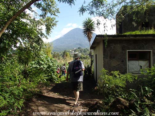 Craig hikes through farmland at Cerro de Oro