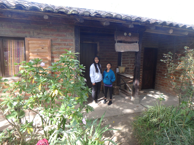 Vanesa and Aracely in front of the guest house