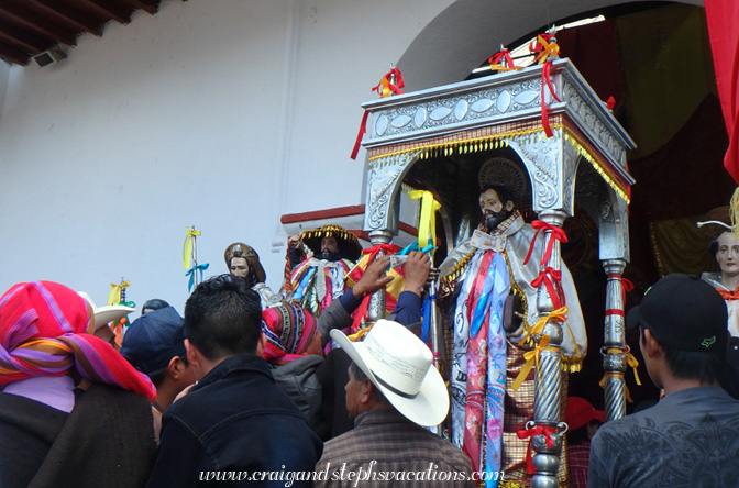 Members of the cofradia chant in Tzutzujil in front of St. James the Warrior