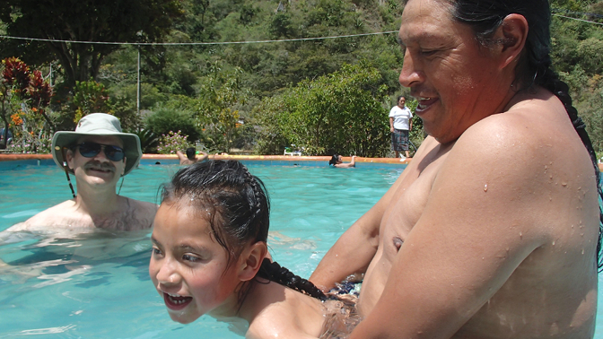 Antonio teaches Yupanqui to swim