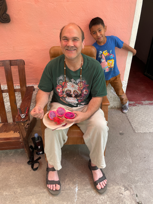 Craig eating pitaya with Ivan