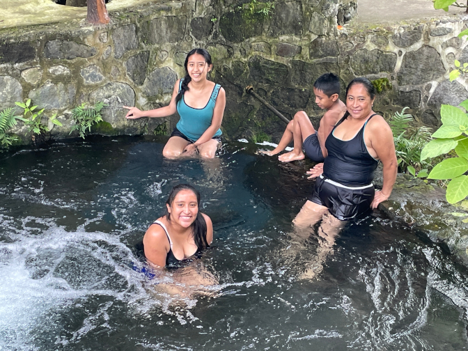 Aracely, Yasmin, Ivan, and Paulina swimming at Piscinas El Manantial