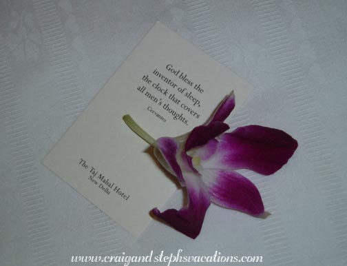 Orchid and Cervantes quotation on the bed