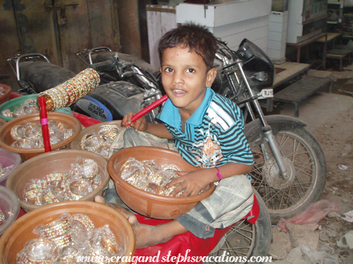 Little boy on a bangle seller's cart, Sardar Market Girdikot, Jodhpur