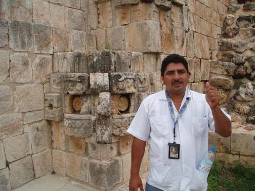 Uxmal - Ricardo in front of a Chaac Mask