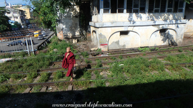The train passes a young Buddhist monk