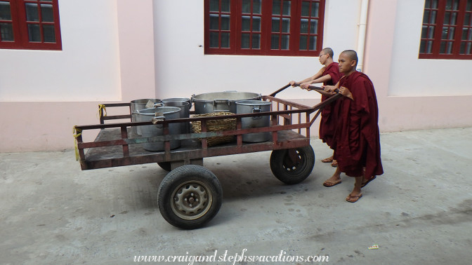 Monks delivering food
