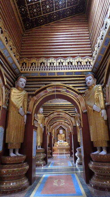 Every surface in Thanboddhay Pagoda is lined with tiny white Buddhas