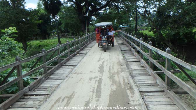 Tuk-tuk ride over a wooden bridge, Kyi Taung Village