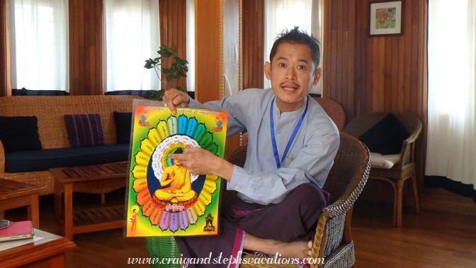 Sandro Win explains the Buddha protection poster in the ship's library