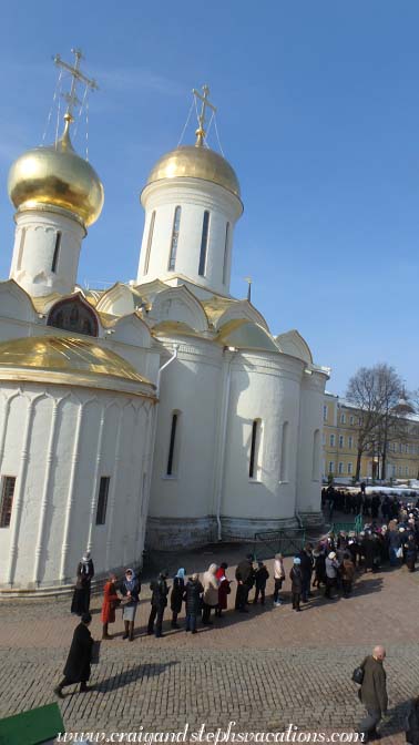 Queue of pilgrims waiting to enter the Cathedral of the Holy Trinity to pray over St Sergius' body