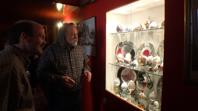 Iurii Petrochenkov shows Craig his porcelain work