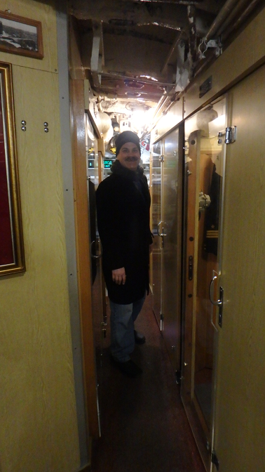 Craig in the hallway of the officer's cabins, C-189