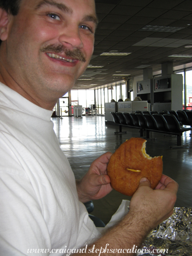 Craig enjoying a johnnycake at the airport