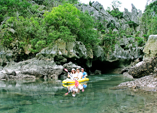 Steph, Craig, and Sea Canoe Cuong kayaking at Halong Bay (photo courtesy of Cuong)