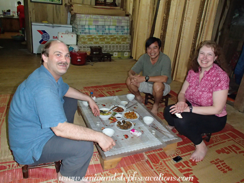 Craig, Cuong, and Steph enjoy dinner at the guest house