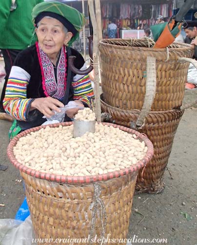 Woman selling peanuts in Tien Thang Market