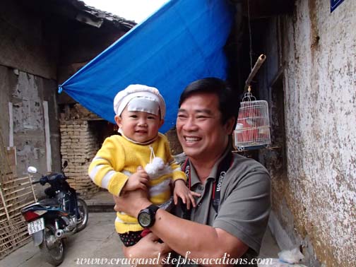 Cuong and a local baby