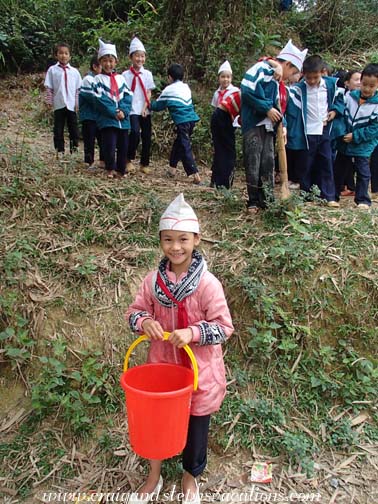 Schoolchildren collecting water