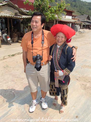 Cuong and a Red Dao elder on the marble slab road of Ta Phin