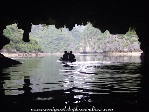 Kaying through a cave in Halong Bay