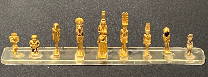 NMEC: Tiny gold statues