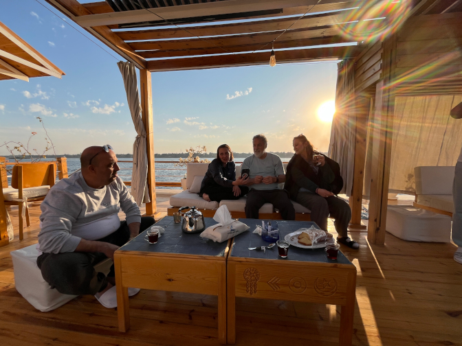 Teatime aboard Dahabiya Safiya: Amr, Mark, Jenn, and Jeanne