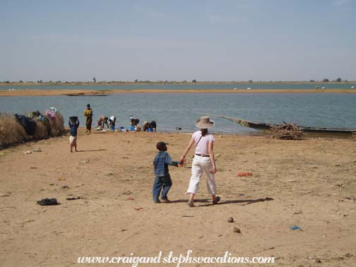 Pam and friend approaching the Niger, Segoukoro