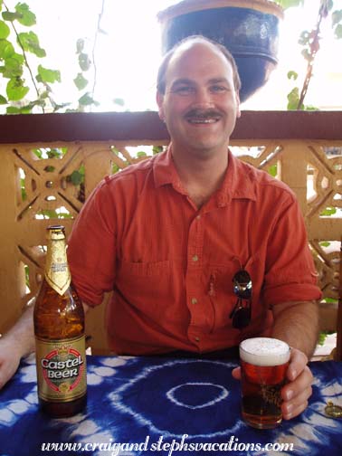 Craig samples local Castel beer