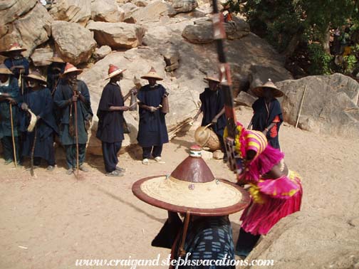 Musicians accompany the Tiu mask