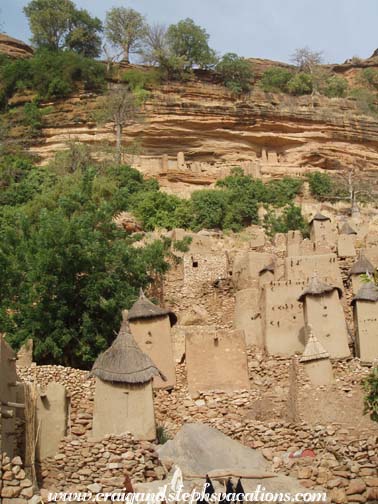 Dogon village with Tellem cliff dwellings above