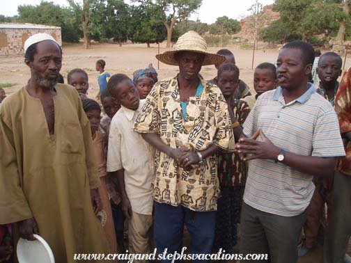 Farewell blessing - Boureima Napo, Chief Amadou Napo, and Daniel