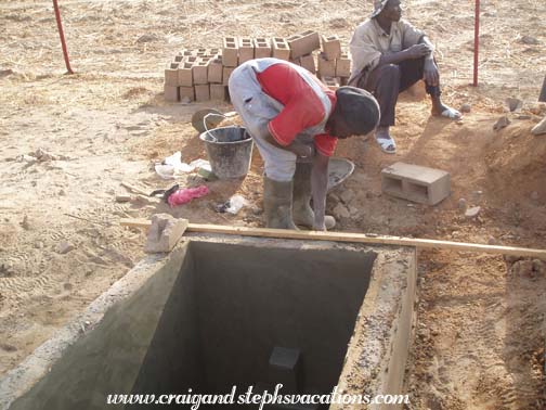 Mason Oumar Degoga puts finishing touches on the water basin