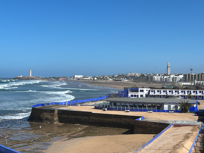 View of the Hassan II Mosque and a lighthouse from Tropicana Space restaurant