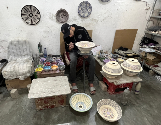 Painting ceramics at Touhafs Fes