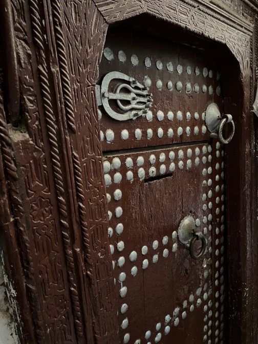 Door with two knockers and a hand of Fatima hinge, Fes El Bali