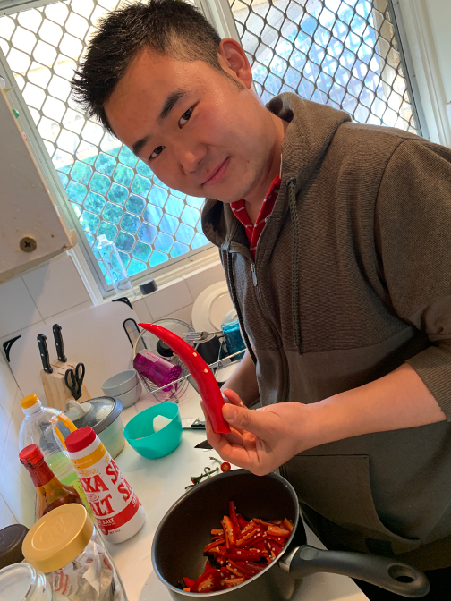 Sonam Tshering cooks ema datsi (chilies and cheese)