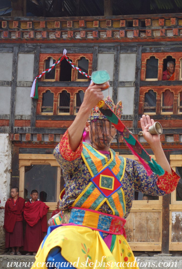 Lama observes the Pacham dance through the window