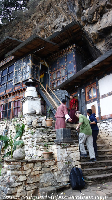 A monk welcomes the men to Hungren Temple