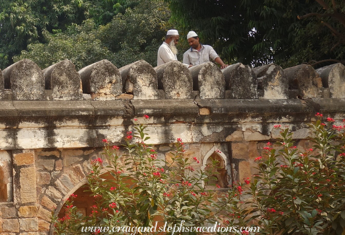 Men chatting at Qutub Minar complex