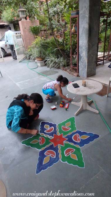 Sonam and Sara painting Diwali decorations